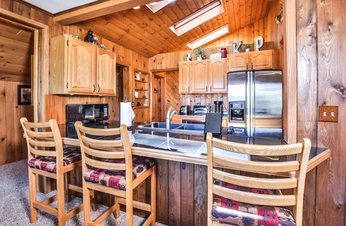 St Germain House | Level lakefront property with spacious cabin, private dock, and fire pit!