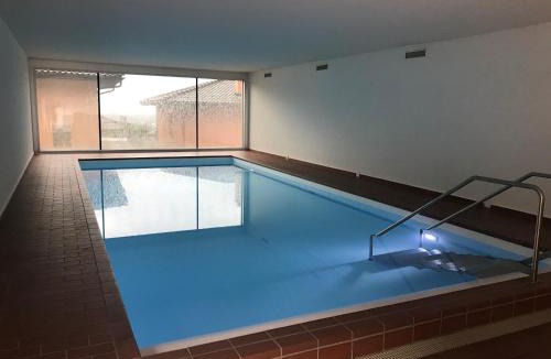 Muralto Apartment | Lichtdurchflutete Ferienwohnung mit Panorama-Sicht und Schwimmbad/Sauna