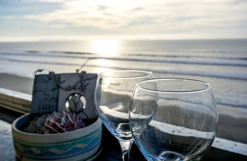 Costa Apartment | Light & Charming Beachfront w/oceanviews, steps to restaurants & nightlife