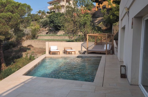 Santa Susanna Villa | Light-Filled Architectural Villa with Terraces, Pool & Mediterranean Views
