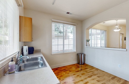 Education Hill House | Light-filled corner townhome with deck, home office & convenient location