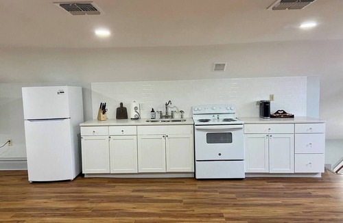 Greater Belhaven Apartment | Light-Filled Loft in 1905 Belhaven Historic Home