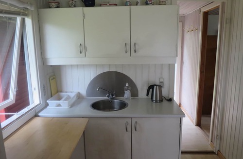 Follenslev Cottage | Light wooden cabin at Zealand's best beach.