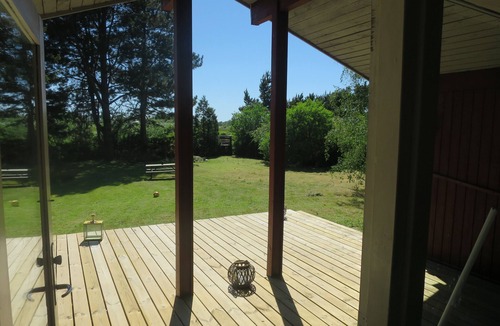 Follenslev Cottage | Light wooden cabin at Zealand's best beach.