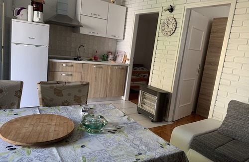 Kornic House | Lily mediterranean apartments with a sea view & heated shared pool