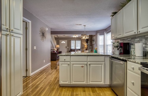 Pigeon Forge Ski Chalet | LITTLE PIGEON RIVER ACCESS-1 Mile to Pigeon Forge-Game room-Theatre system-Hot Tub and more