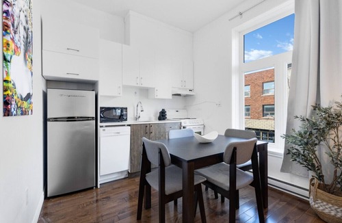 Plateau Mont Royal Apartment | LiV MTL | Modern Studio + Rooftop F1 Grand Prix