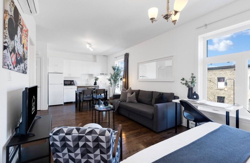 Plateau Mont Royal Apartment | LiV MTL | Modern Studio + Rooftop F1 Grand Prix