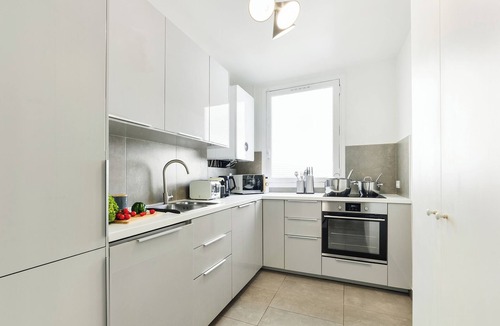 Quartier de Rochechouart Apartment | LivinParis | Luxury AC 4 Bedrooms Opera Lafayette IV