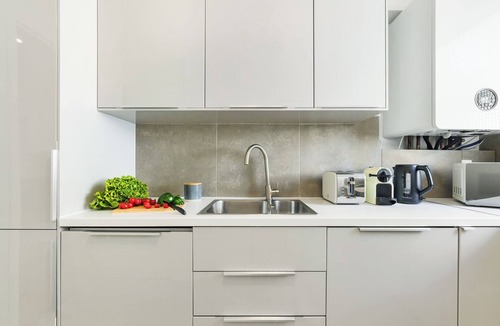 Quartier de Rochechouart Apartment | LivinParis | Luxury AC 4 Bedrooms Opera Lafayette IV