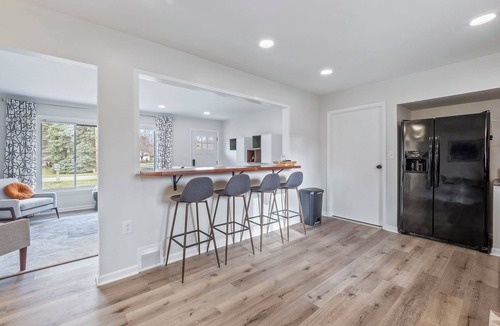 Manistee House | Locals Landing: Modern Family Retreat midway to Casino, River, & Lake Michigan