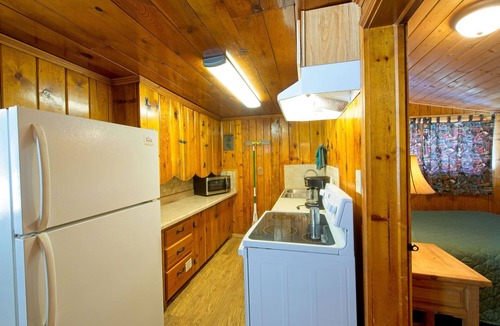 Red River Cabin | Located by the River facing the Mountains