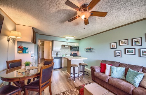 New Braunfels Condo | Located right on the Comal River! Pool, hot tub, direct river access!