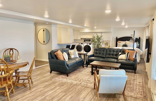 East Hillside Apartment | Location and panoramic lake views will make for an unforgettable experience.