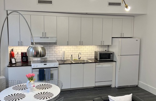 Central Business District Condo | Location! Location! Location! “Happy Chic” 3BR/2BA modern condo near Bourbon!