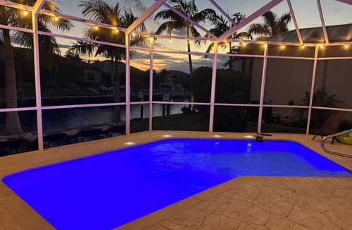 Punta Gorda House | LOCATION! Modern waterfront home;1-block to FishermanVillage; HEATED SALT POOL