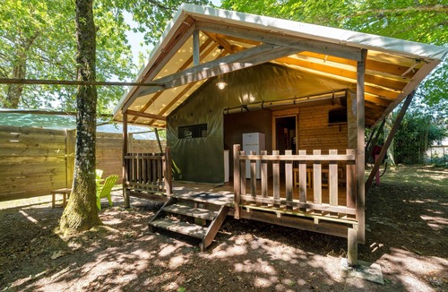 Lesperon RV Rental | 'Lodge 2' with shared pool, private terrace and shared garden