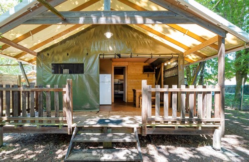 Lesperon RV Rental | 'Lodge 2' with shared pool, private terrace and shared garden