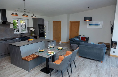 Garve House | Lodge with private hot tub.