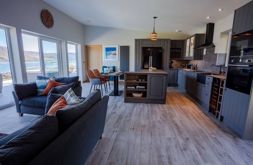 Garve House | Lodge with private hot tub.