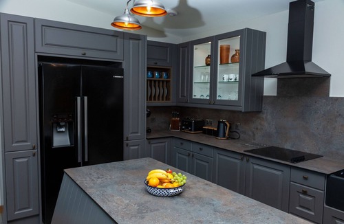 Garve House | Lodge with private hot tub.