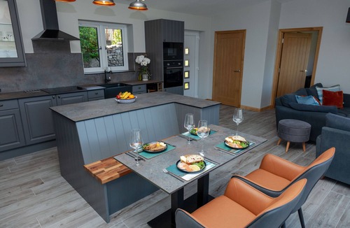 Garve House | Lodge with private hot tub.