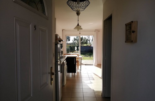 Jonzac Apartment | Lodging 2 *with wooden terrace and small garden