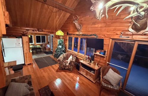 Chute-Saint-Philippe Ski Chalet | Log cabin, a haven of peace. Guaranteed privacy right on the water's edge