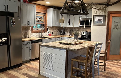 Garden Valley Cabin | Log Cabin Golf Course Front-Terrace Lakes, gorgeous wrap around deck with views