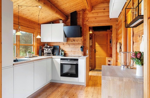 Yderby House | Log cabin in first row by Sejerø Bay