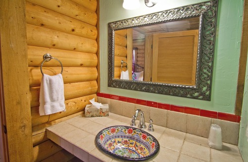 Daingerfield Cabin | Log cabin overlooking a private lake on a working farm