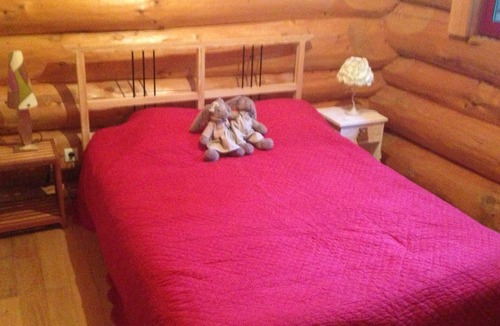 Plesse Ski Chalet | Log cabin (rough logs) among the trees and spa