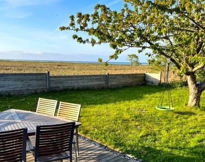 Ørsted House | Log Cabin With Water Views Near Fjellerup Beach