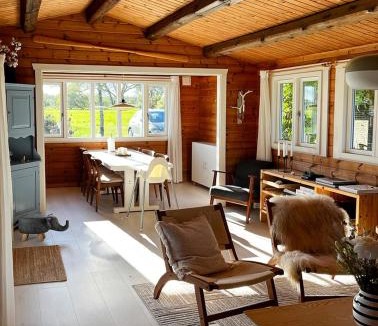 Ørsted House | Log Cabin With Water Views Near Fjellerup Beach