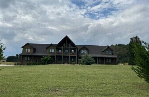 Bowdon Junction House | Log Castle and a Spring Fed Lake