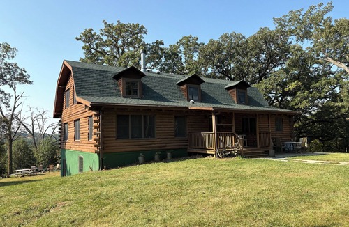 Coon Rapids House | Log House at Whiterock Conservancy