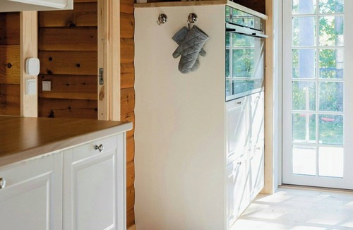 Udsholt Sand House | Log house close to the sea and coastal towns