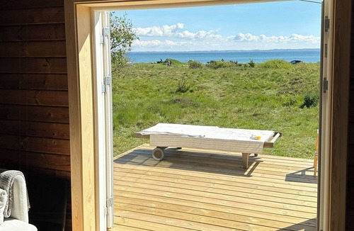 Sjllands Odde House | Log house in the first row at the Sejerø Bay