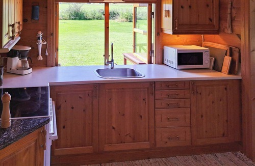 Holbaek House | Log house near Kisserup with vintage charm