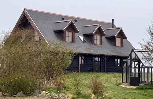Lemvig House | Log house with views of sea fjord and Lemvig