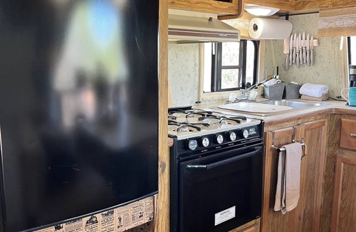 Sweetwater House | Lonesome Dove a Vintage 1-bedroom camper with large covered deck pet friendly