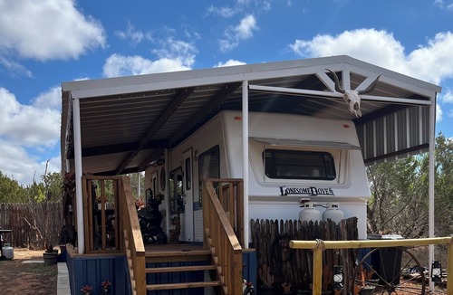 Sweetwater House | Lonesome Dove a Vintage 1-bedroom camper with large covered deck pet friendly