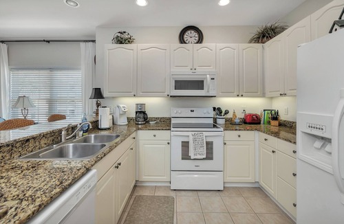 St. Simons Island Condo | Long distance marsh views and community pool.