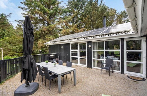 Vejers House | Look forward to an enjoyable vacation in this attractive vacation home with indoor pool.