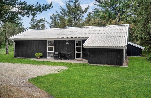 Vejers House | Look forward to an enjoyable vacation in this attractive vacation home with indoor pool.