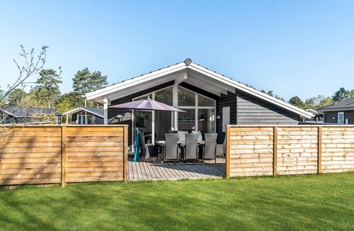 Nykøbing House | Look forward to a fantastic sandy beach near this inviting house with a large terrace.