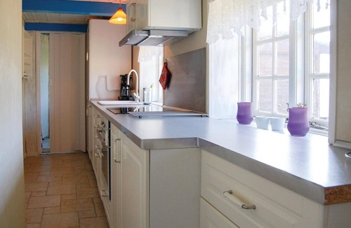 Nymindegab House | Look forward to a relaxing holiday in this charming holiday home with a traditional thatched roof.
