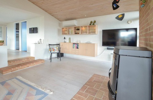 Ronbjerg House | Look forward to a relaxing vacation in this cozy cottage with fantastic views of the fjord.