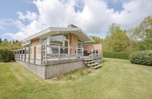 Ronbjerg House | Look forward to a relaxing vacation in this cozy cottage with fantastic views of the fjord.