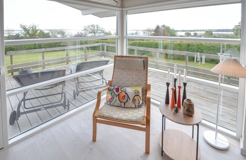 Ronbjerg House | Look forward to a relaxing vacation in this cozy cottage with fantastic views of the fjord.